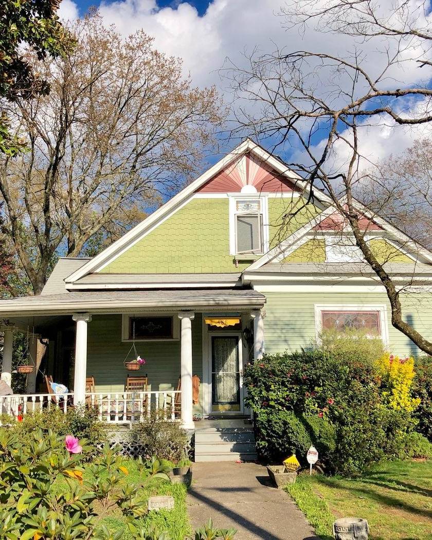 A green house with a front garden in Grant Park, Atlanta