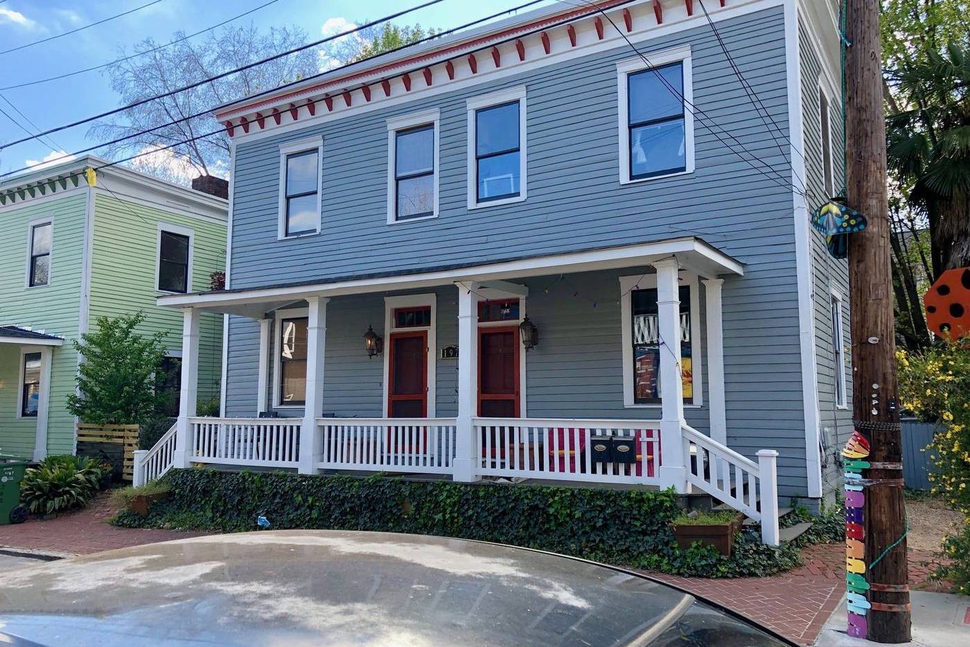 A blue two-story house in Cabbagetown, Atlanta
