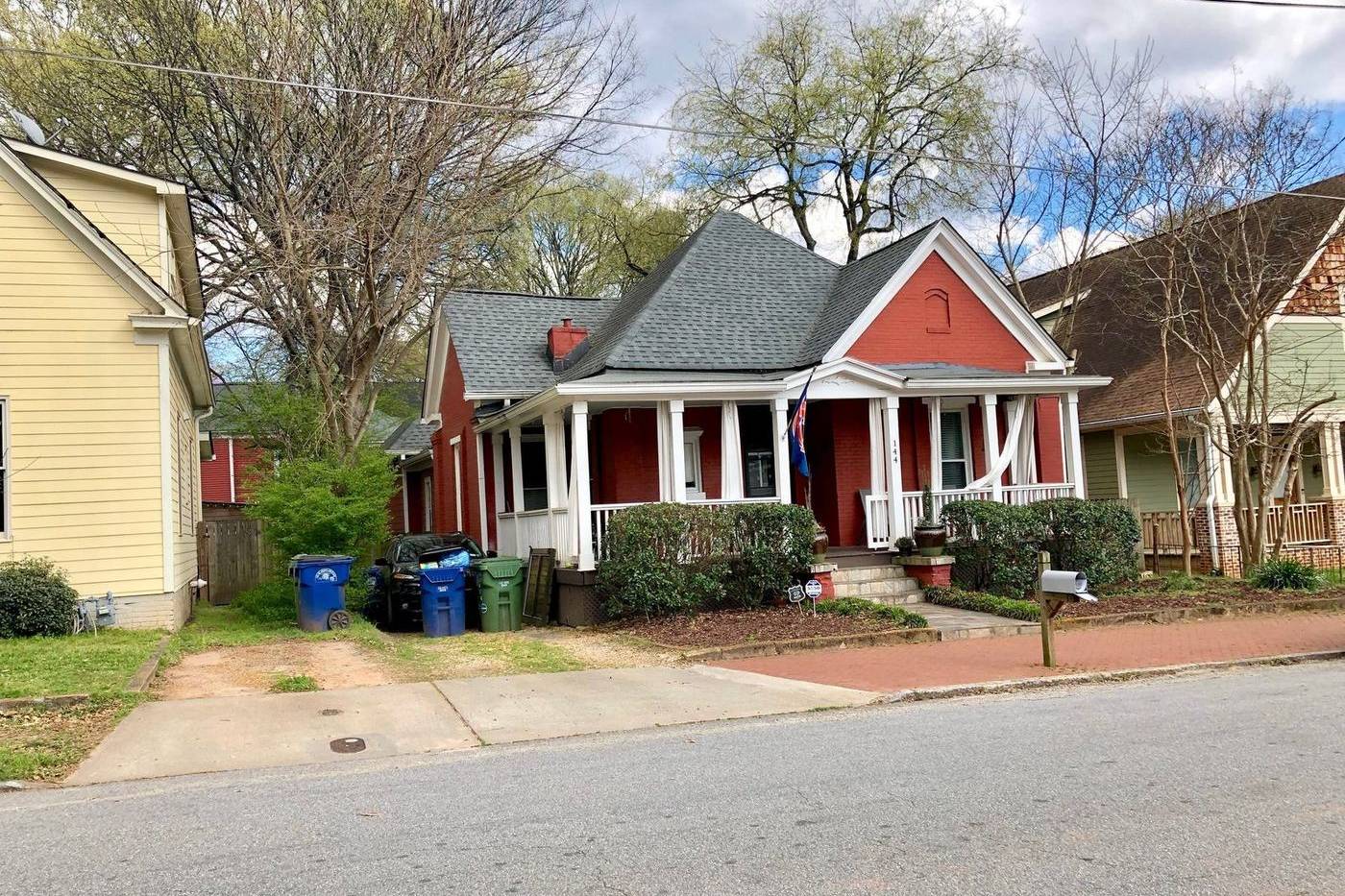 A red cottage on a Cabbagetown street in Atlanta